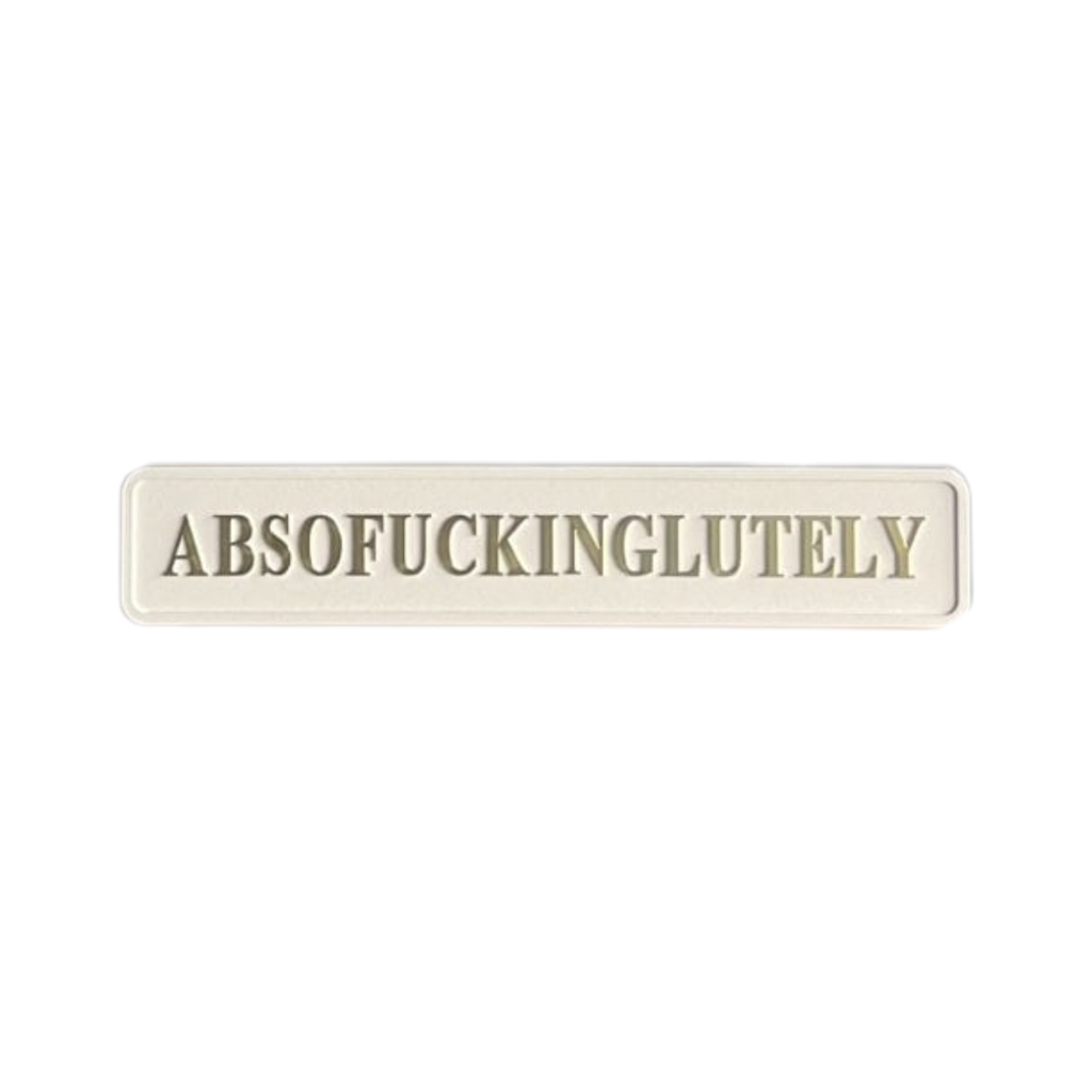 Cream 'Absofuckinglutely' street sign with gold foiled text