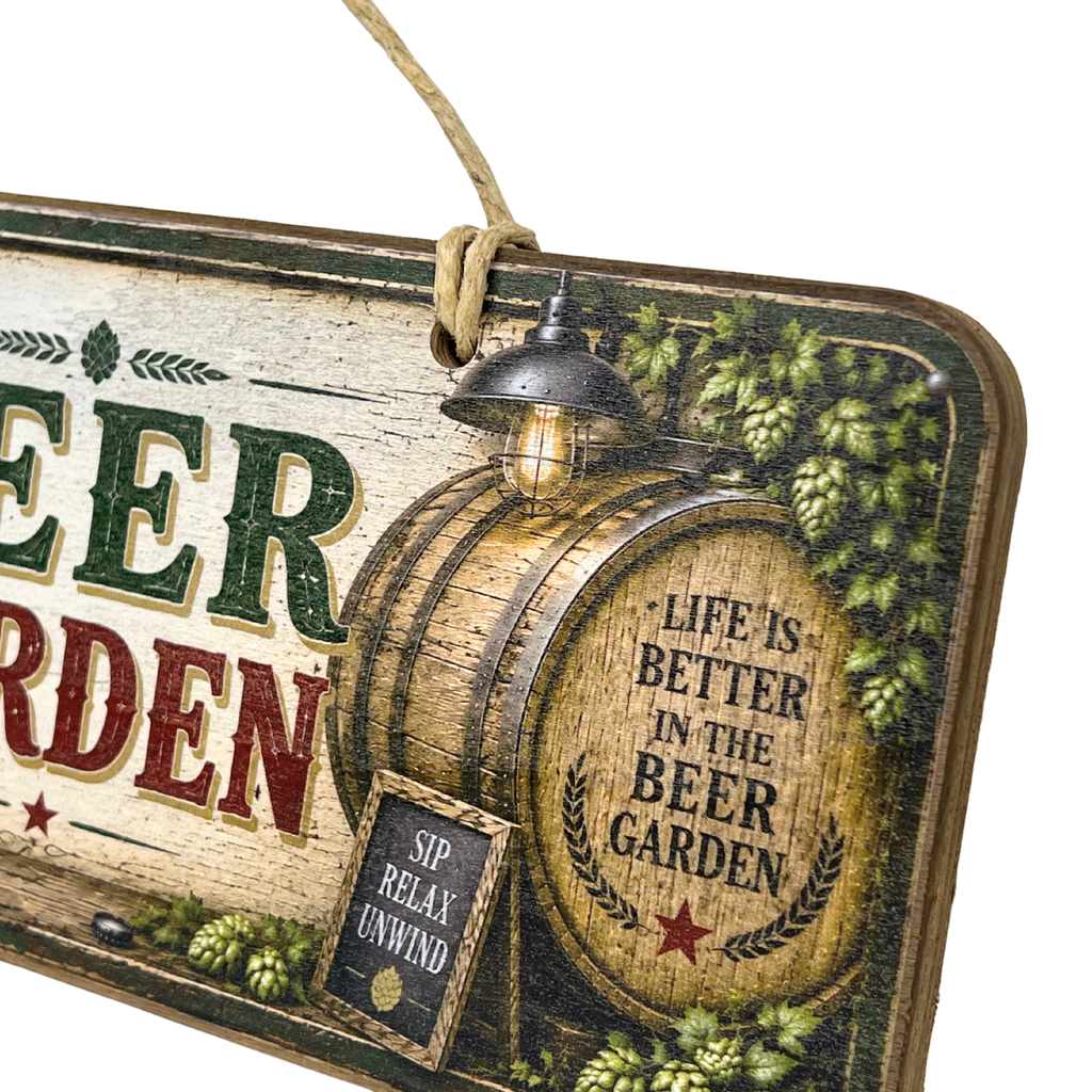 A rustic decorative wooden sign hanging by a rope, featuring a beer garden theme with a wooden barrel, hop cones, stars, and the phrases 'BEER GARDEN' and 'LIFE IS BETTER IN THE BEER GARDEN'.