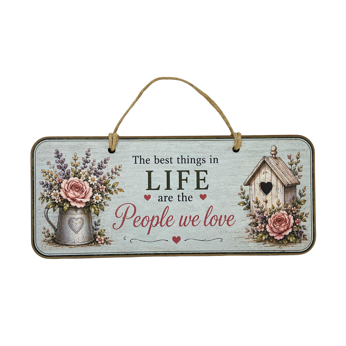 A rectangular hanging wall sign with a rustic distressed light blue-gray background. The sign features the text 'The best things in LIFE are the People we love' in black and dusty pink lettering, decorated with illustrations of pink roses in a galvanized metal pitcher on the left and a small wooden birdhouse on the right.