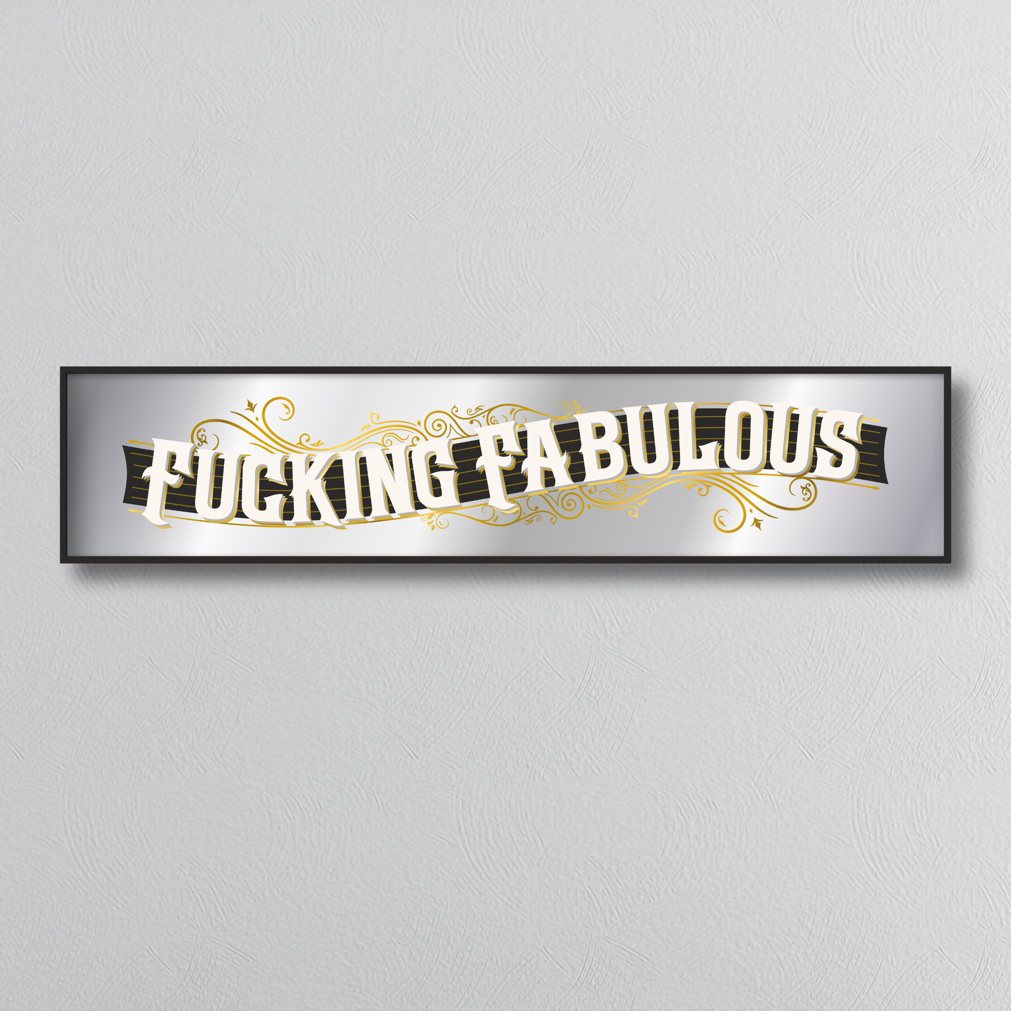 Decorative mirror sign with 'Fucking Fabulous' art deco style text on a gray background