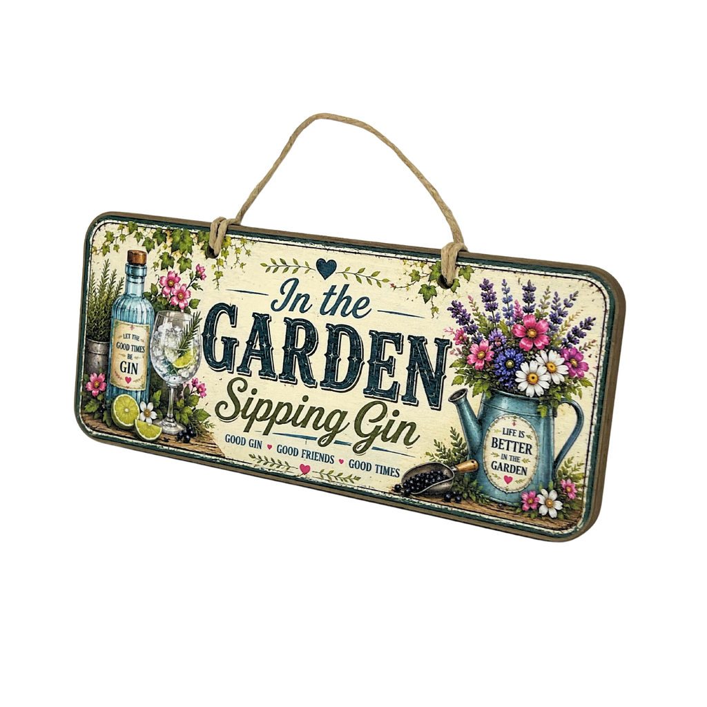 A rectangular hanging wall sign with a rustic twine handle, featuring vintage-style garden and gin-themed artwork. The sign reads “In the GARDEN Sipping Gin” with illustrations of a gin bottle, glass, flowers, lavender, and a watering can on a cream background.