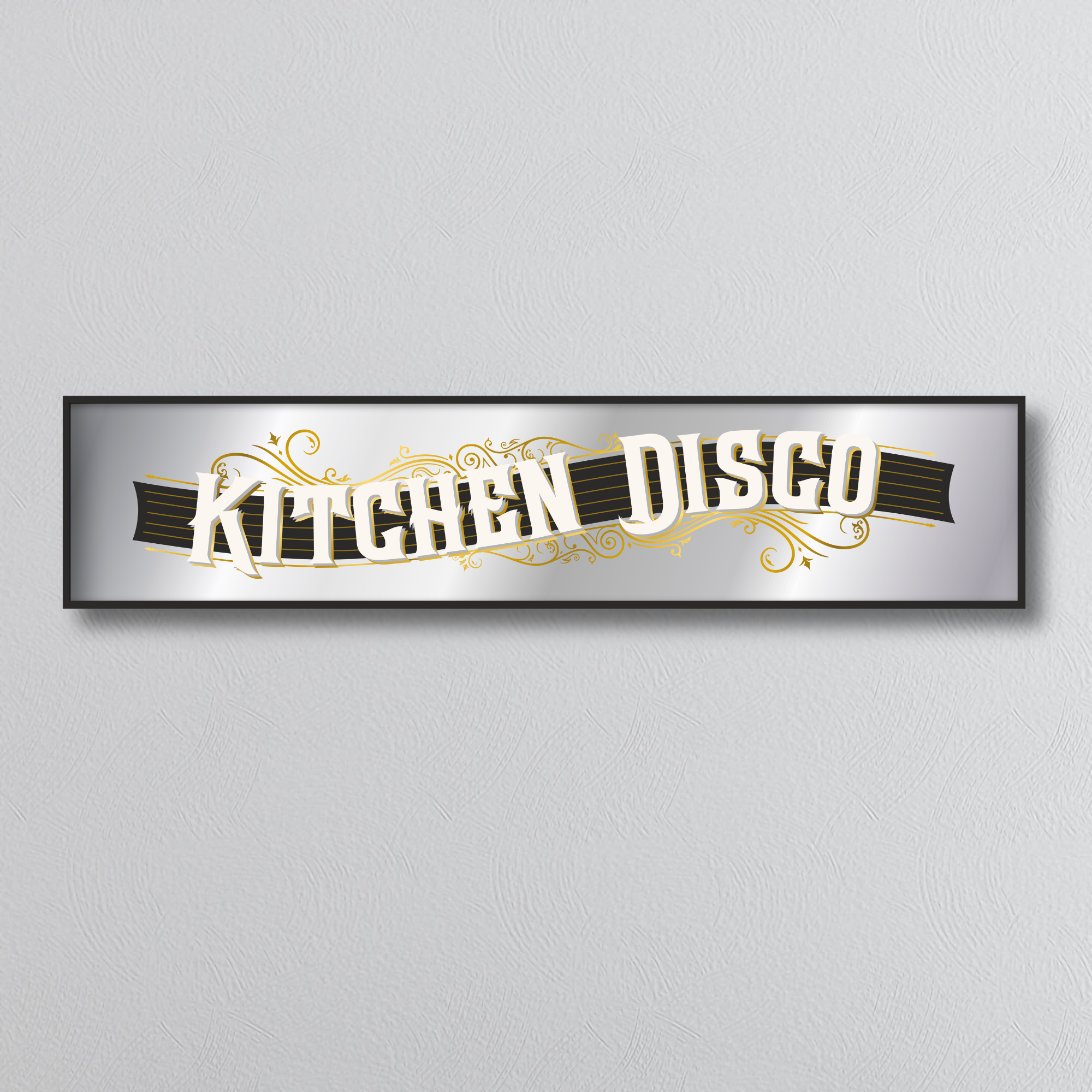 Decorative mirror sign with 'Kitchen Disco' art deco style text on a light gray background