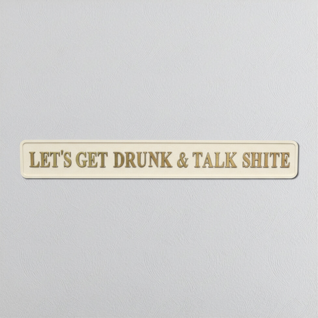 Cream rectangular sign with gold text 'LET'S GET DRUNK & TALK SHITE' on a light gray background