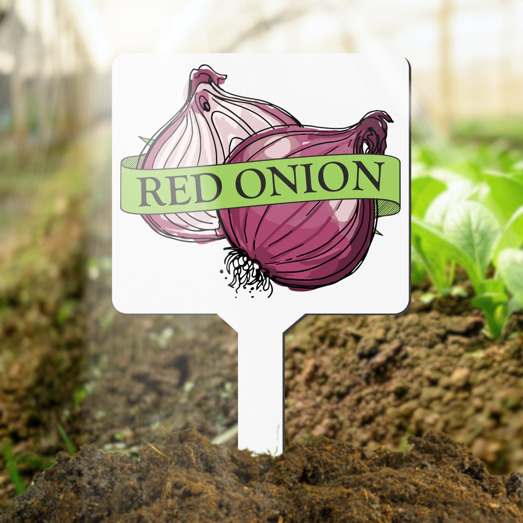 Garden marker with red onion illustration and text in a garden setting
