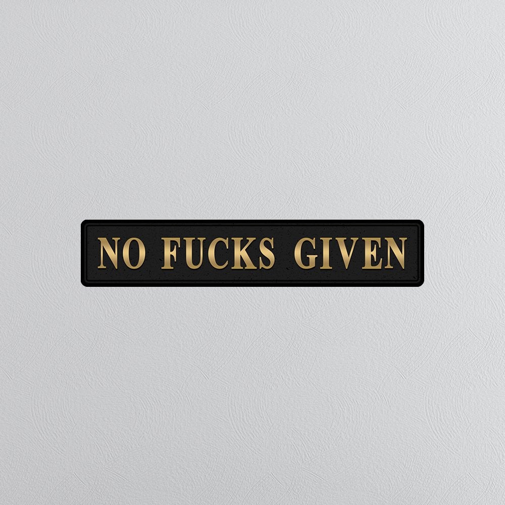 Black and gold foiled street sign with 'no fucks given' wording
