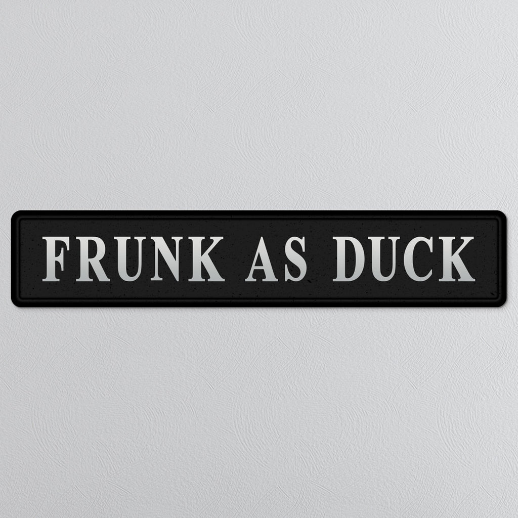 Black and silver foiled street sign with 'Frunk as duck' wording