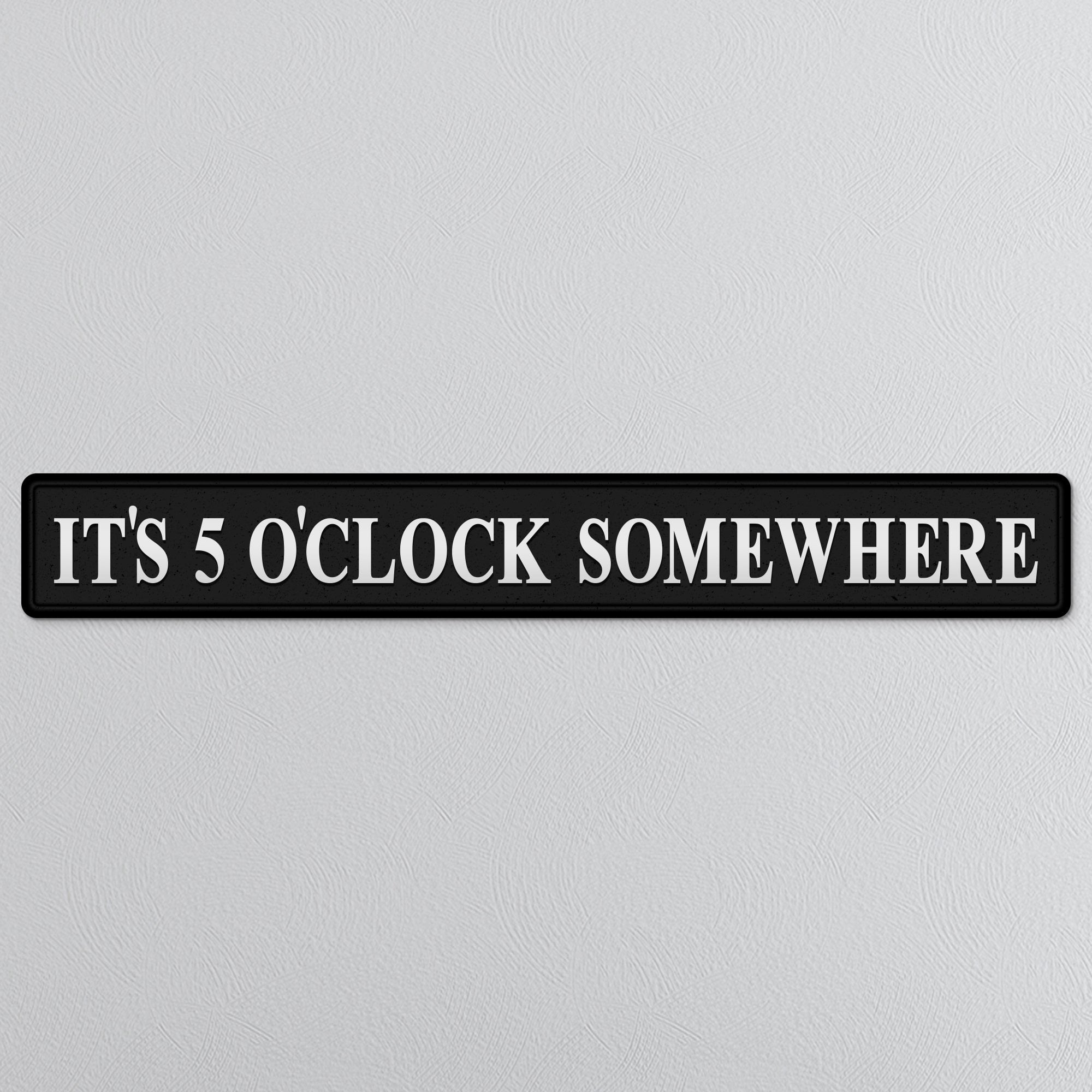 Black and silver foiled street sign with 'It's 5 o'clock somewhere' wording