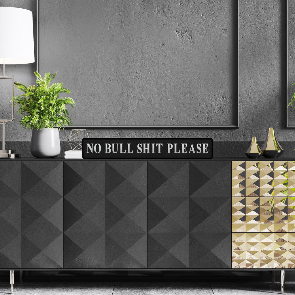 Black and silver foiled street sign with 'No bullshit please' wording