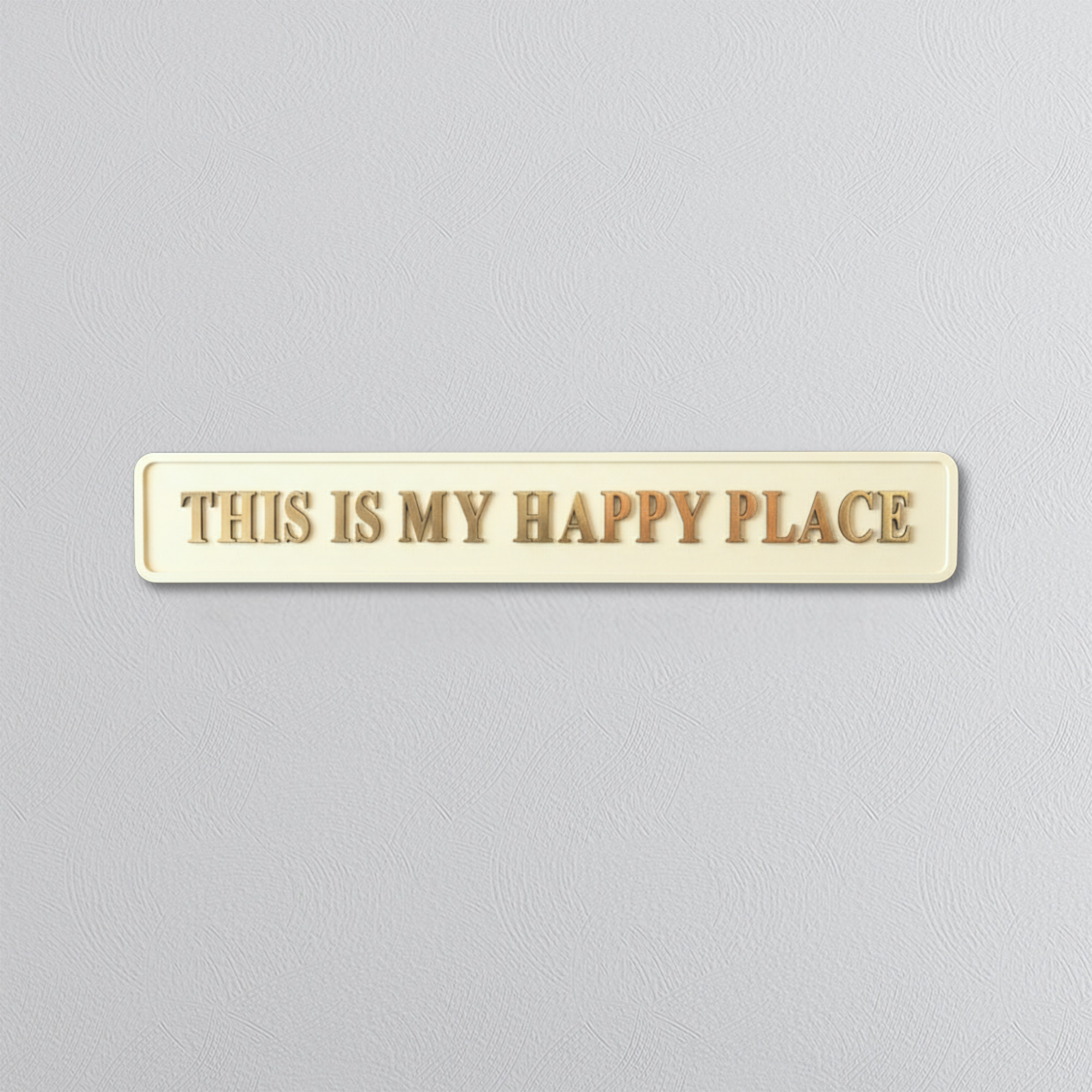 Rectangular plaque with 'THIS IS MY HAPPY PLACE' gold text on a gray background