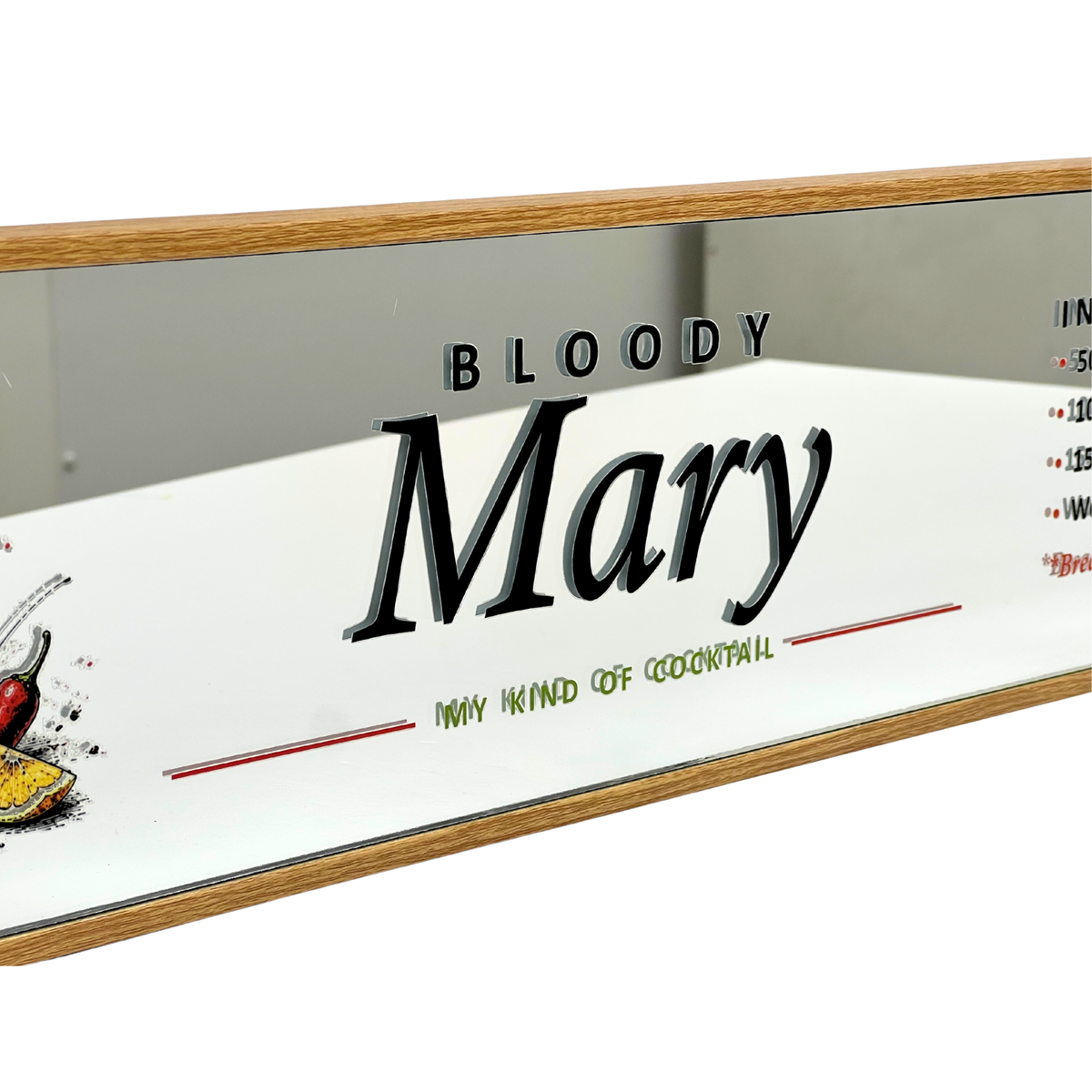 A rectangular bar sign with a light wood frame and mirrored surface, featuring the text 'BLOODY Mary' and 'MY KIND OF COCKTAIL' on a white background.