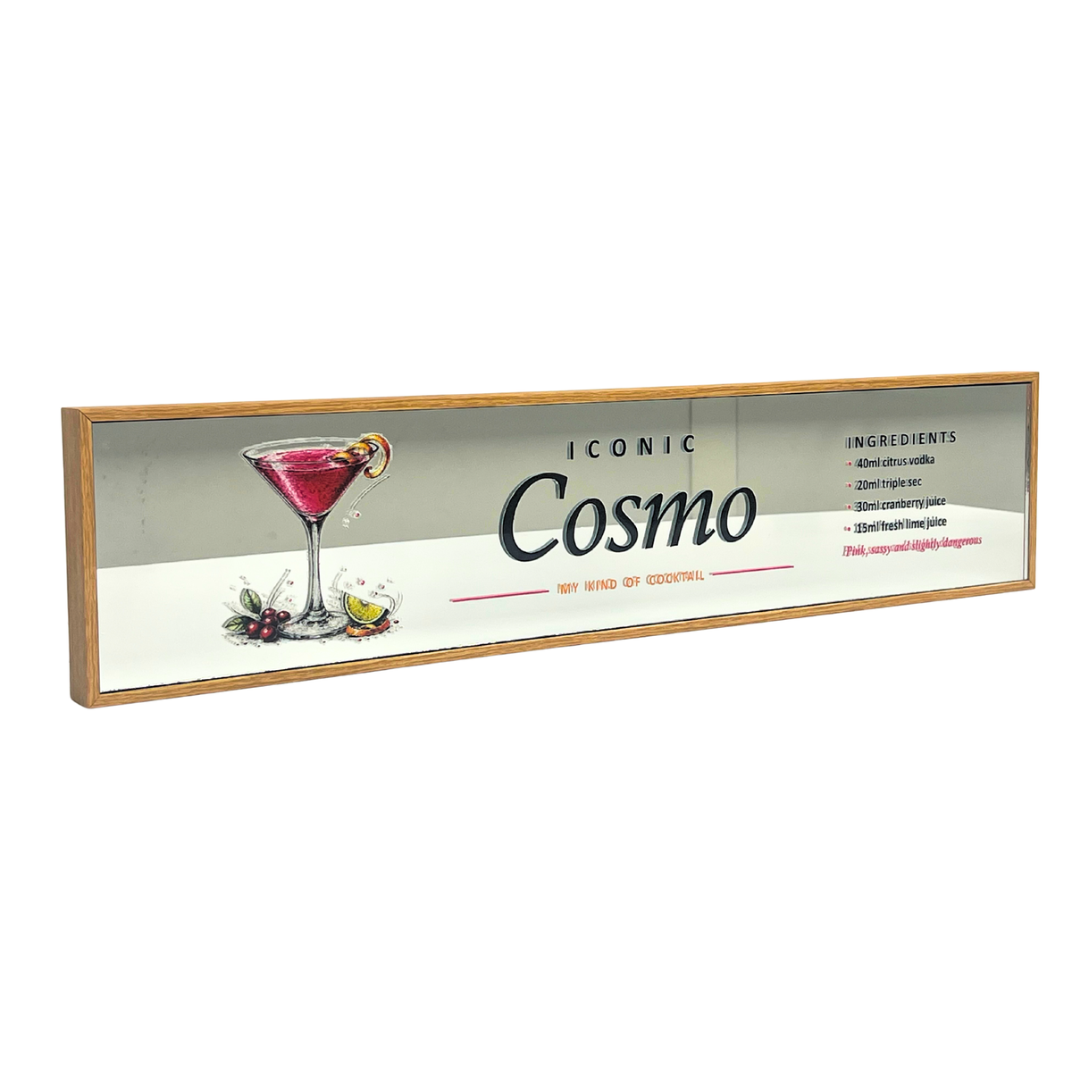 A rectangular framed wall sign featuring the text 'ICONIC Cosmo' and a recipe-style ingredient list, with an illustration of a pink martini cocktail and small garnish details, shown against a plain white background.