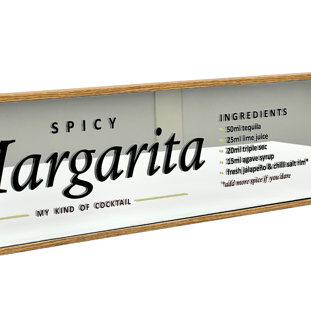 A rectangular glass cocktail sign with a light wood frame, featuring the text 'SPICY Margarita' and a list of ingredients on a white background.