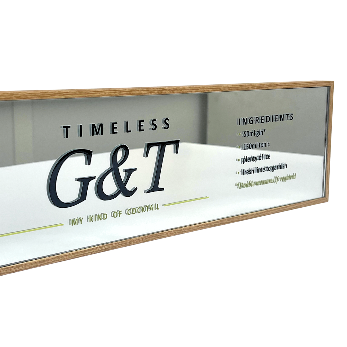 A framed glass sign featuring the text 'TIMELESS G&T' and 'MY KIND OF COCKTAIL' with a small ingredients list on a white background.